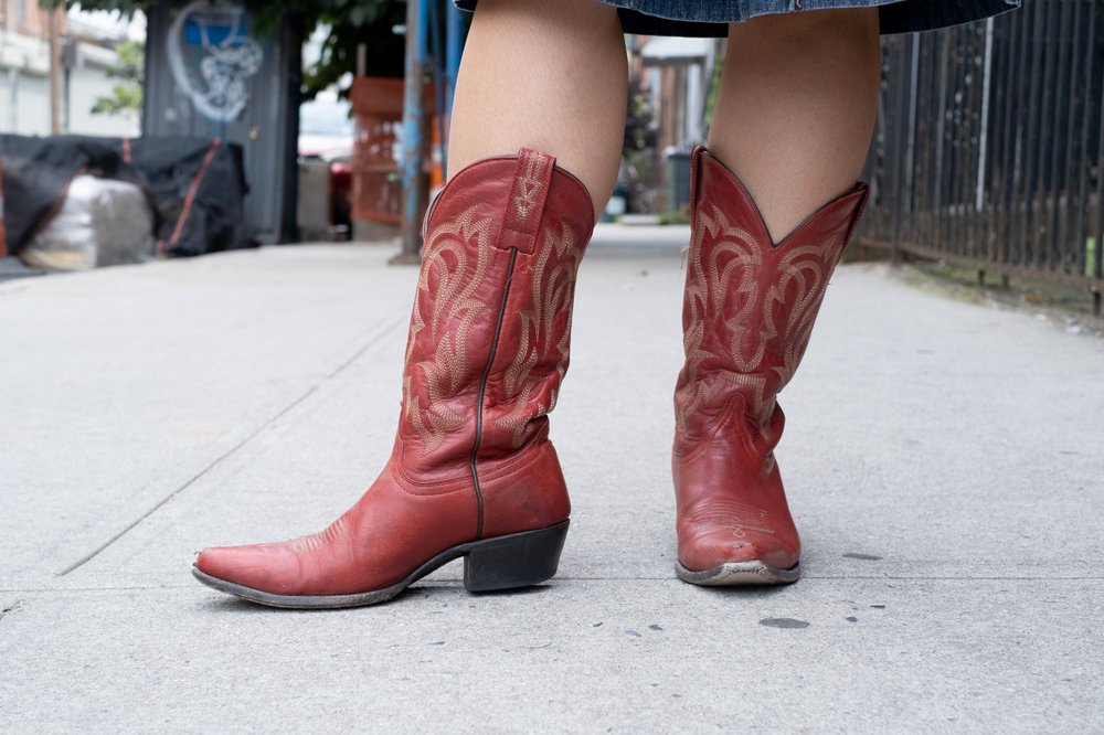 A close-up of red boots