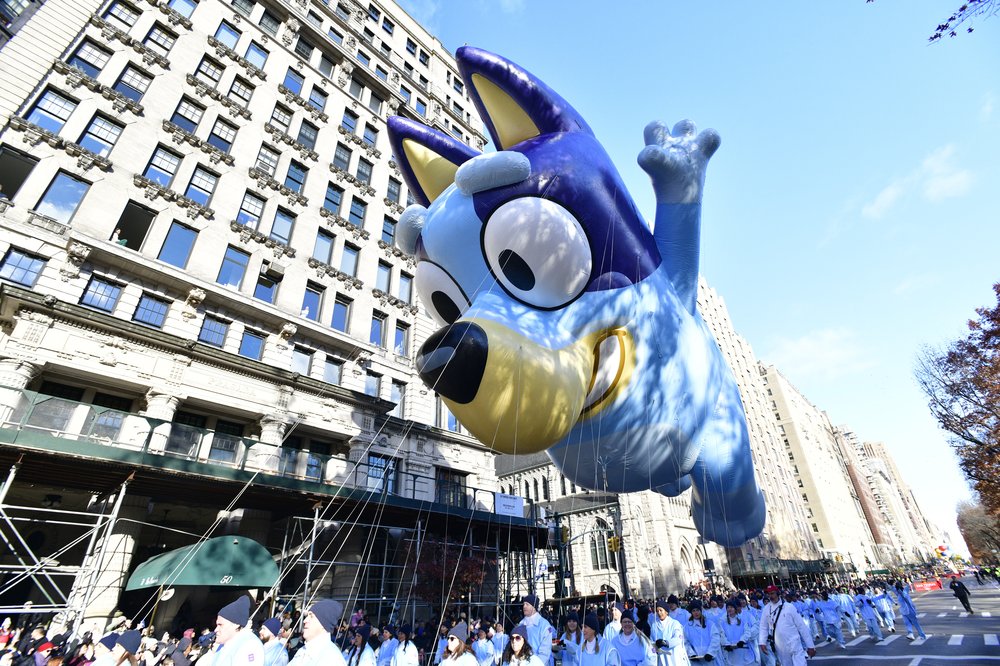 An enormous blue balloon of a dog.