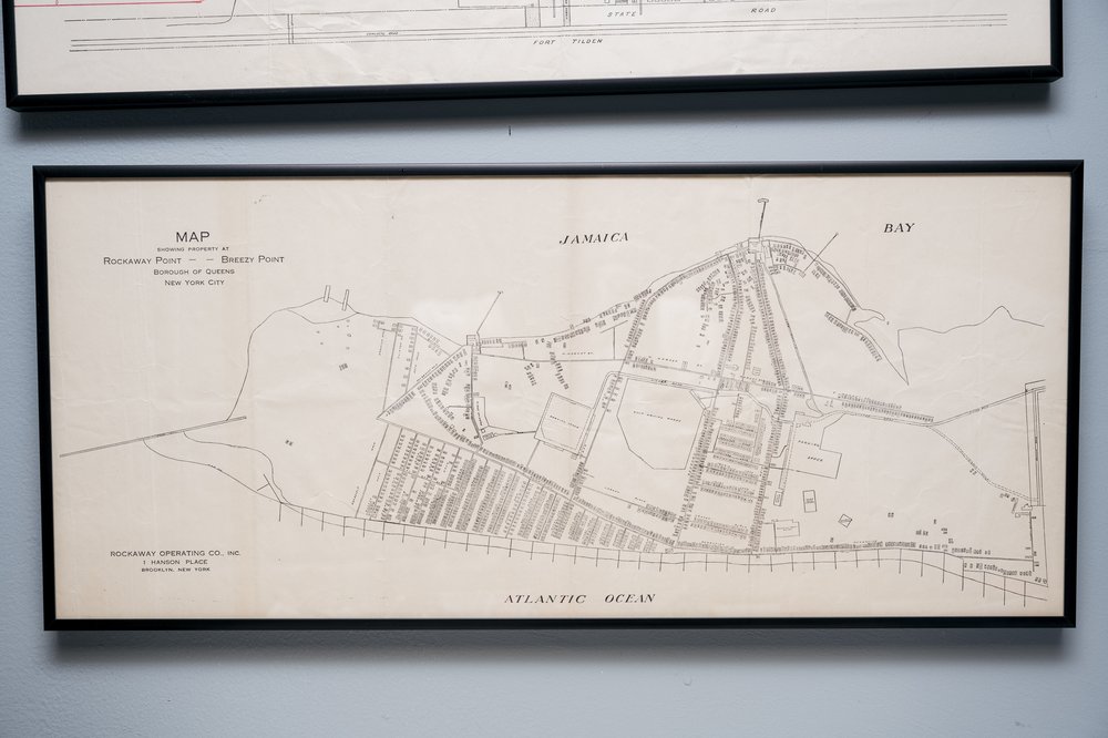 An outdated map of Breezy Point hangs on display at the Breezy Point Historical Society.