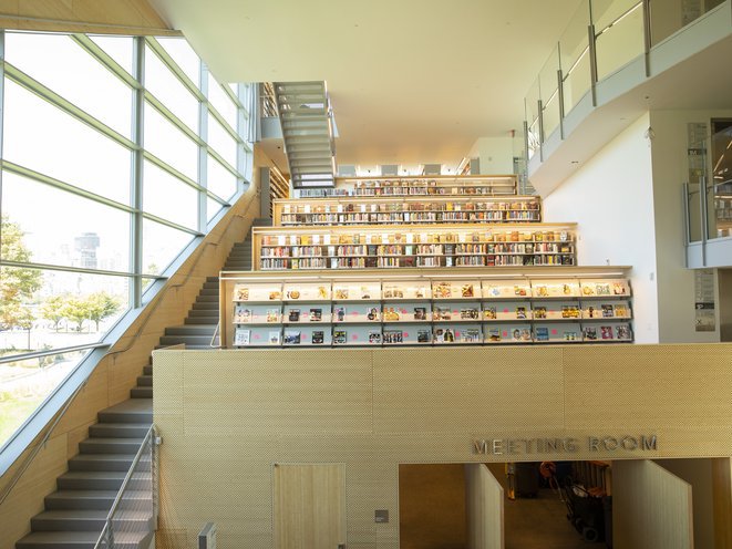 Patrons must go up a set of stairs to enter three fiction sections in the new Hunters Point Library.