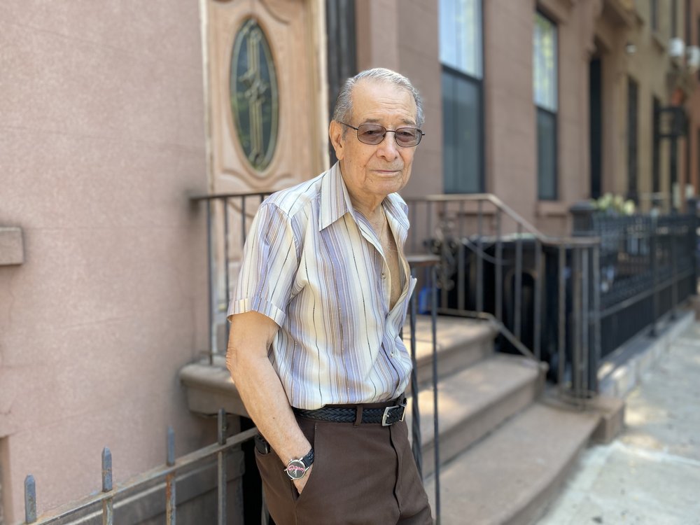Ray Cortez, alleged deed theft victim, outside his home in Brooklyn.