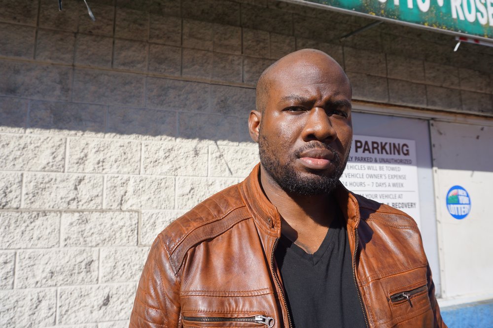 Officer Murashea Bovell standing in front of a gas station in Mount Vernon’s south side.