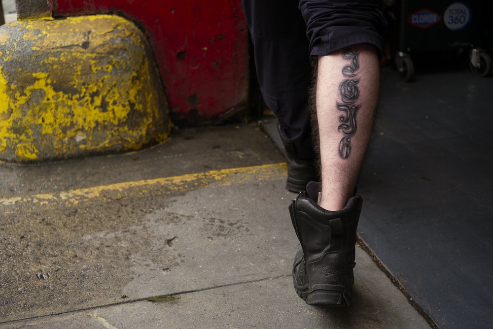 EMT Vincent Polizzi shows off his tattoo, IGY6, which is a symbol of solidarity with others dealing with post-traumatic stress disorder.