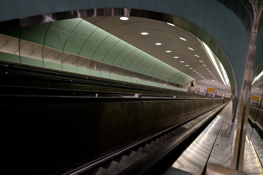 Another cavernous tunnel with lights above