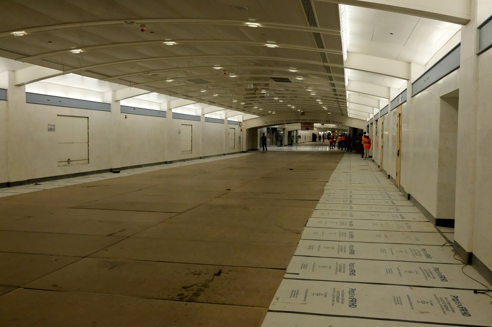 A long empty hallway in the new station