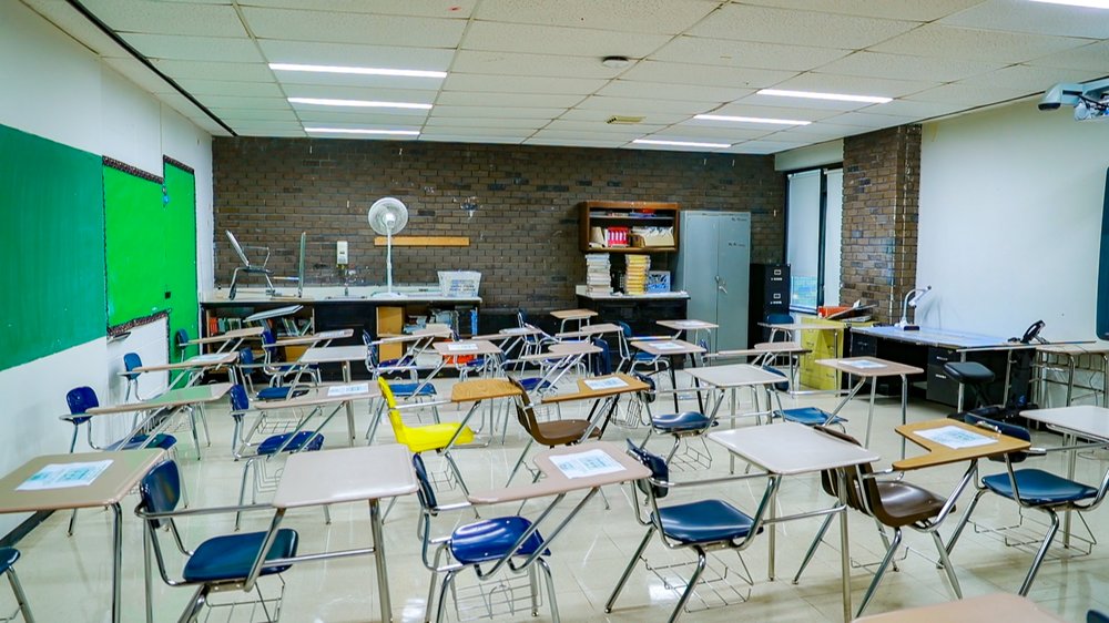 An empty public school classroom.