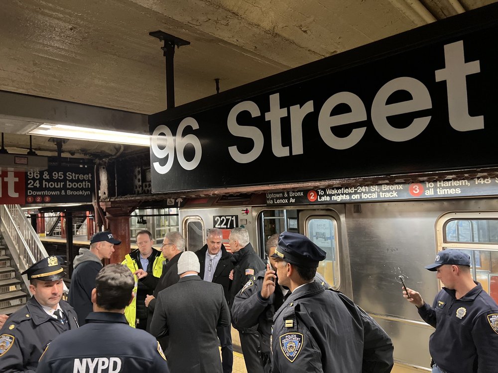 Authorities respond to the train derailment in Manhattan on Thursday.