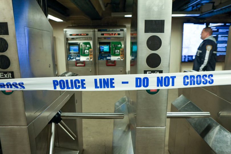 Police tape at the Bronx subway station where multiple people were shot on Monday.