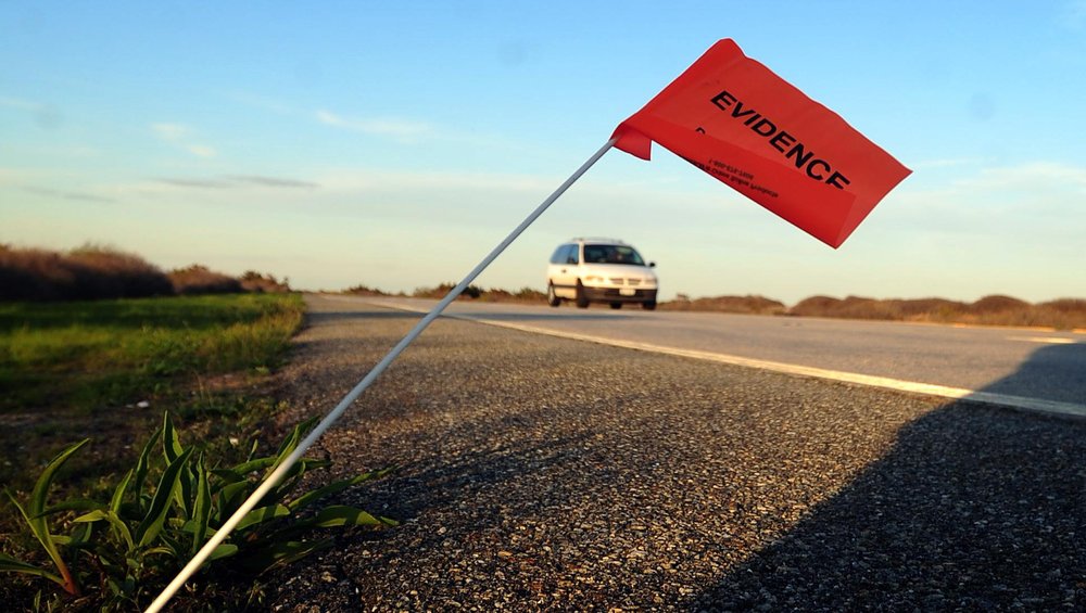 A photo of an evidence marker in the Gilgo Beach murder investigation