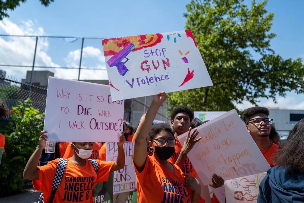 A photo of students from various Bronx schools participating in a rally to end gun violence after student Angellyh Yambo who was gunned down outside of her Bronx school in 2022