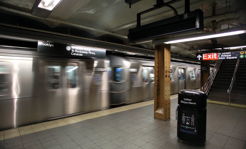 A train speeds through the station in Manhattan.