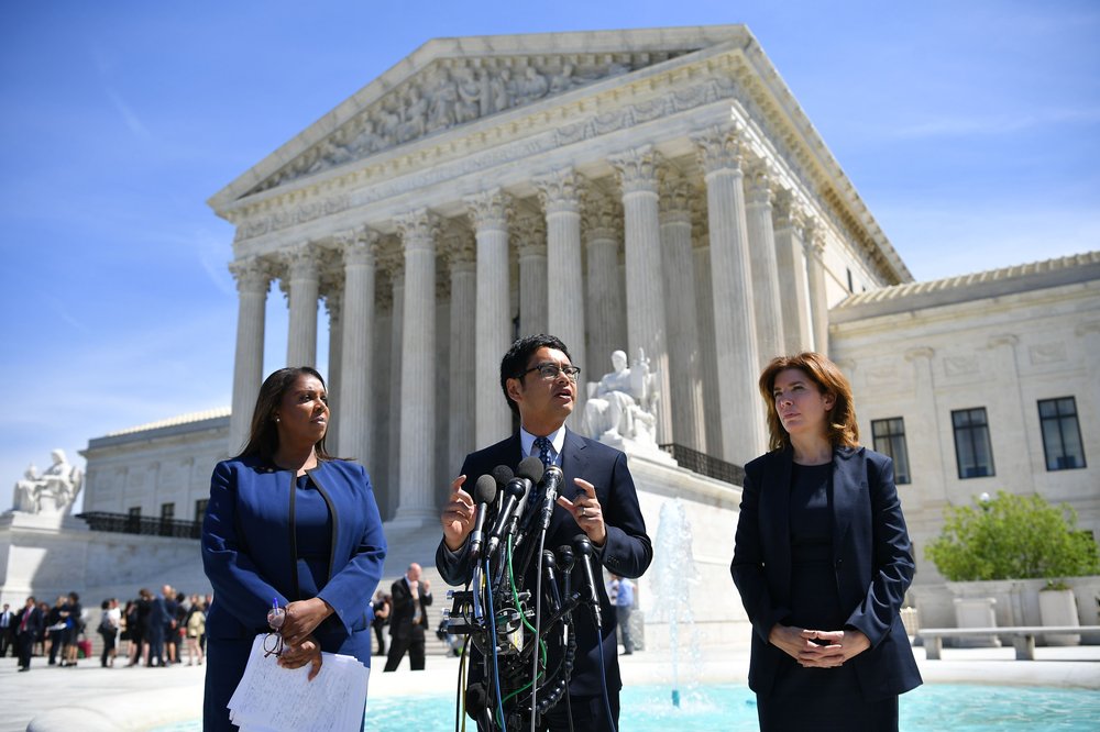 Judge Dale Ho in 2019, when he was the ACLU's voting rights project director, outside the U.S. Supreme Court with New York Attorney General Letitia James, at left, and Director of the Census for New York City Julie Menin, at right.
