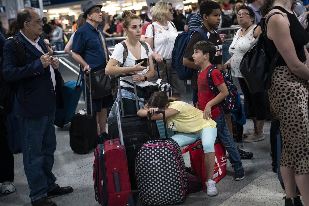 Passengers wait to board delayed Amtrak trains at New York Penn Station, June 19, 2019 in New York City.