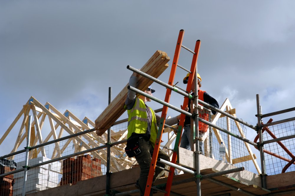 Laborers at work on a construction site.