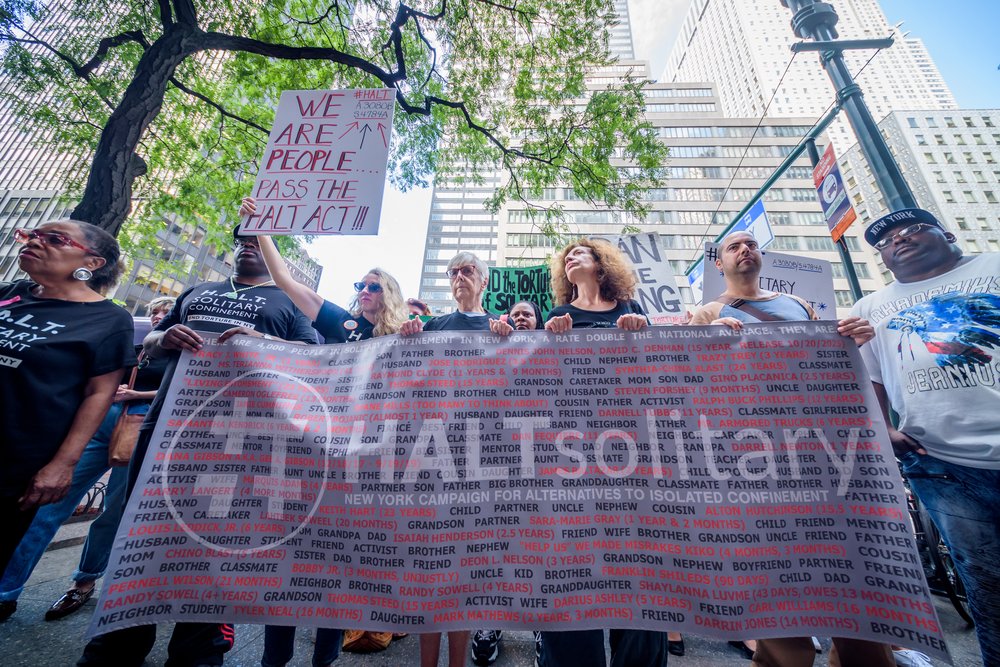 People previously in solitary confinement, family members, New York State legislators, and others rally outside then-Gov. Andrew Cuomo's office in Manhattan to support the HALT Act in 2019.