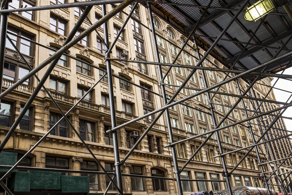 A building wrapped in scaffolding in New York City