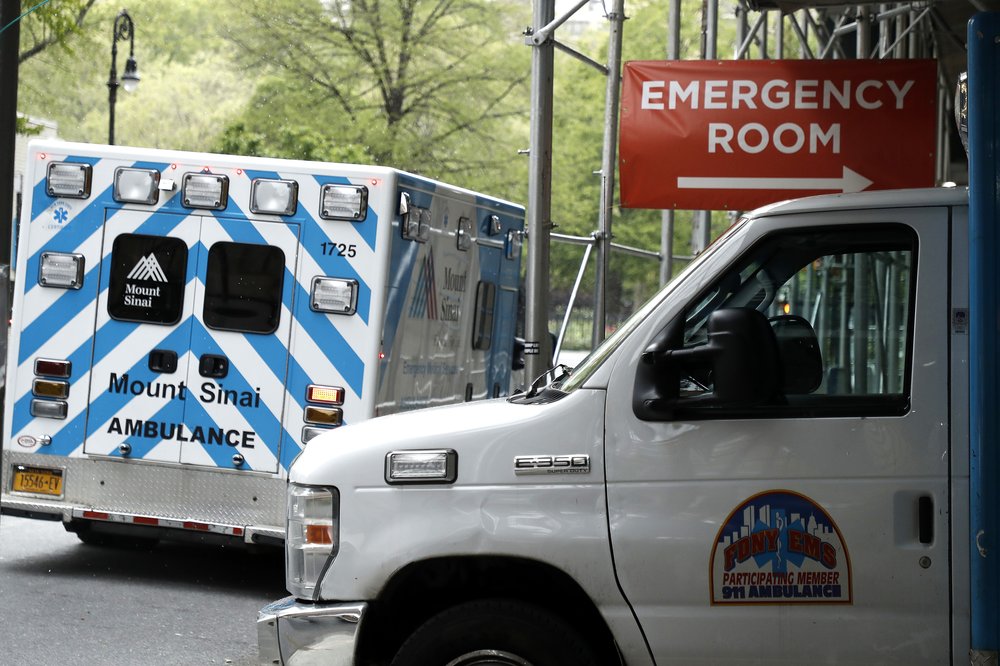 Ambulances are parked in front of the emergency entrance to Mount Sinai Beth Israel Hospital in 2020.