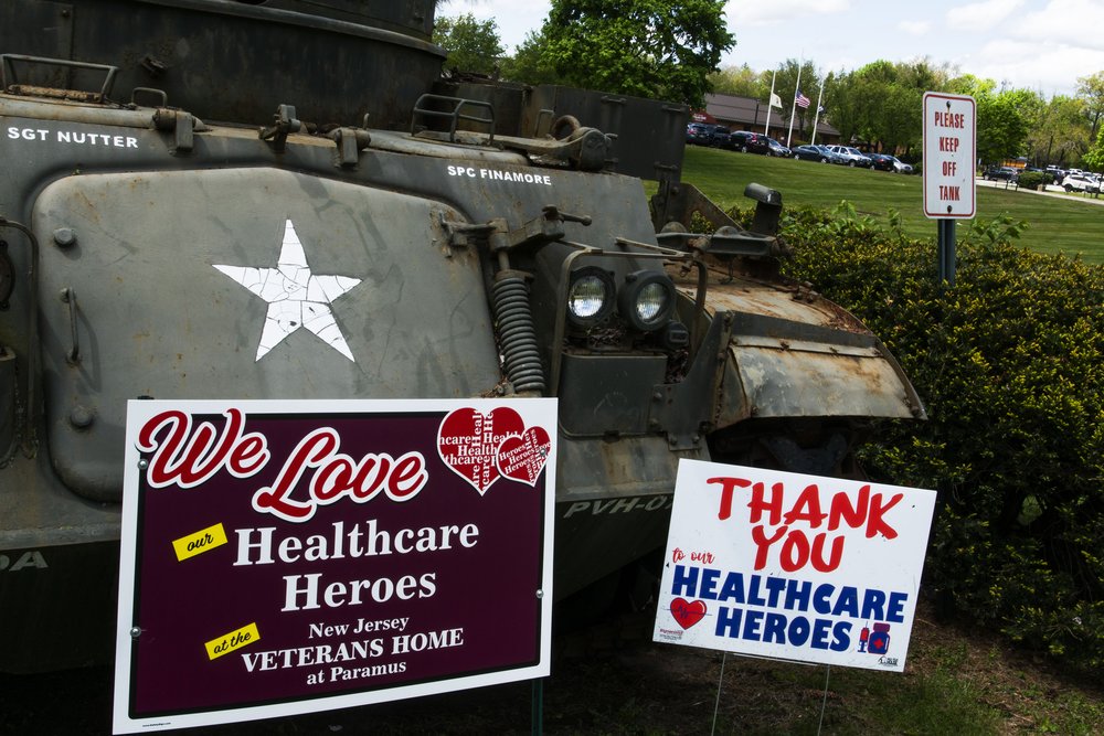 Placards honoring healthcare workers are displayed at the entrance at the New Jersey Veteran's Home on May 11, 2020.
