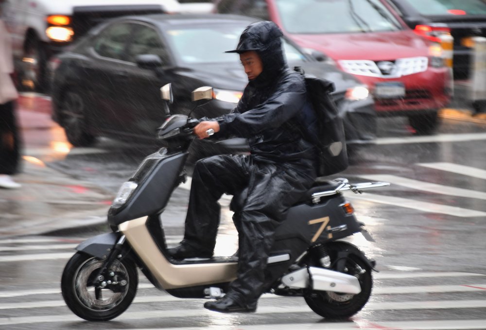 A moped rider in New York City.