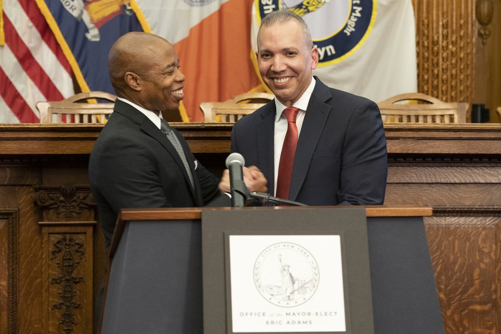 Then Mayor-elect Eric Adams congratulates Louis Molina as his pick for Department of Correction Commissioner at Brooklyn Borough Hall in 2021.