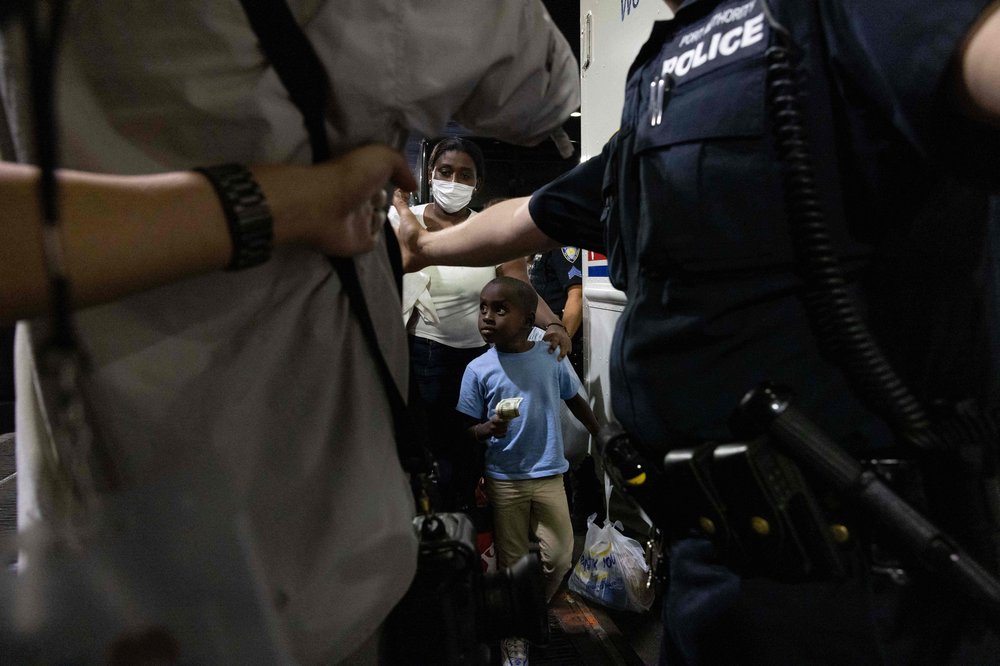 A bus carrying migrants from Texas arrives at Port Authority Bus Terminal on Aug. 10, 2022, in New York. Texas has sent tens of thousands of migrants from the border state into Washington, D.C., New York City, and other areas.