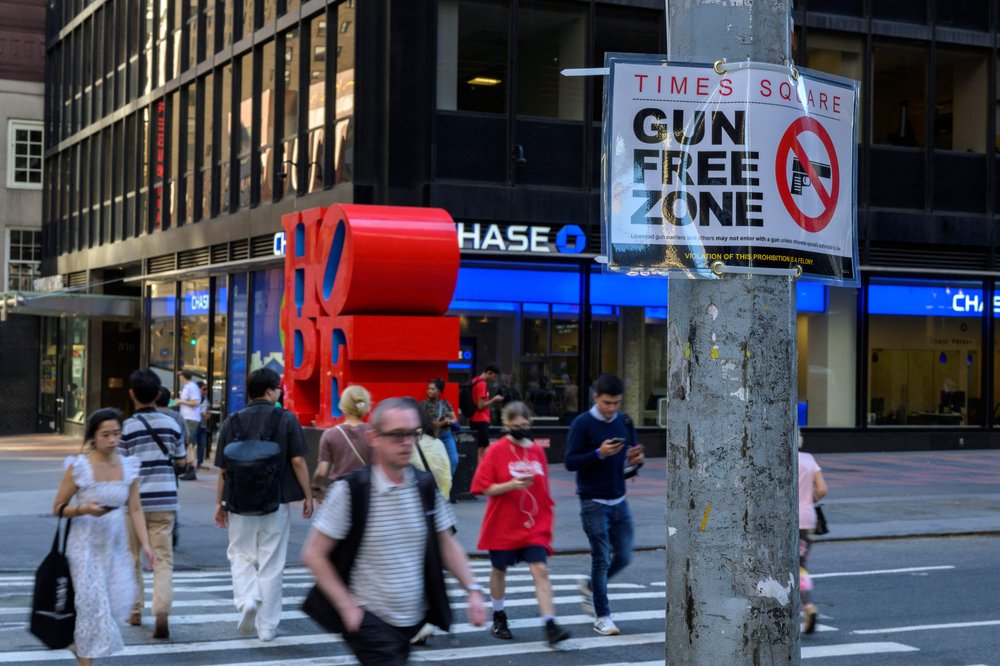 A "Gun Free Zone" sign is seen posted near Times Square in Manhattan on September 1, 2022 in New York.