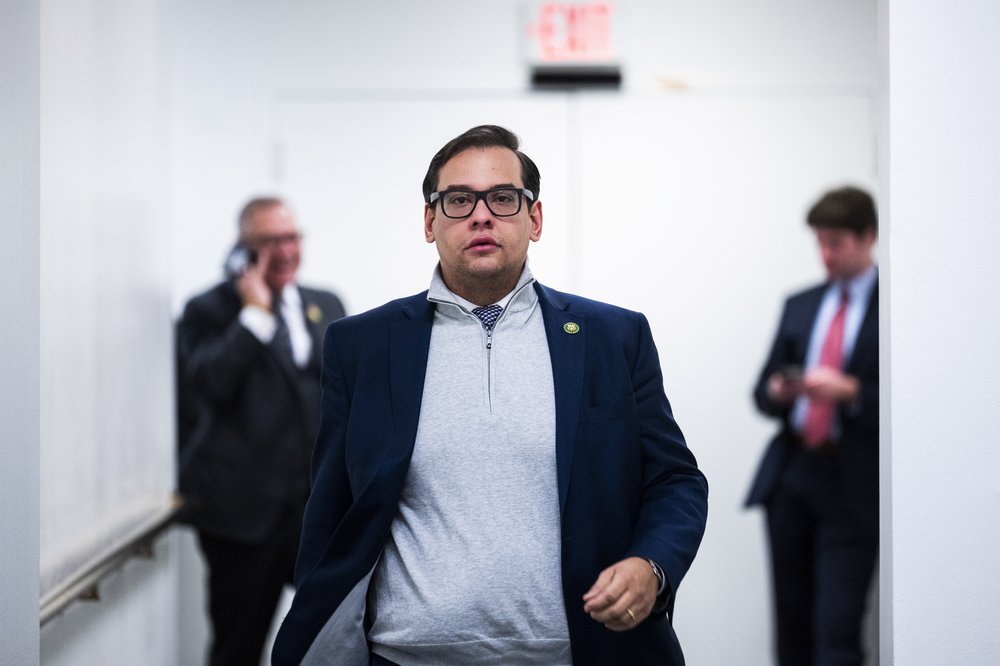 Rep. George Santos, R-N.Y., is seen outside a House Republican Conference meeting in the U.S. Capitol on Tuesday, January 10. Two New York Democratic members of Congress have filed an ethics complaint against Santos.