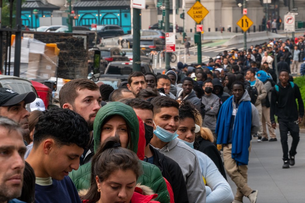 Photo of asylum-seekers outside the courthouse