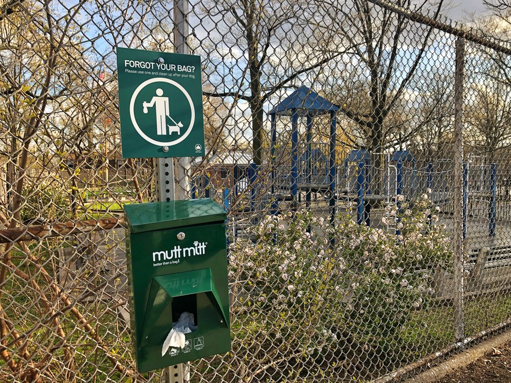 A dog-waste bag dispenser in Queens.