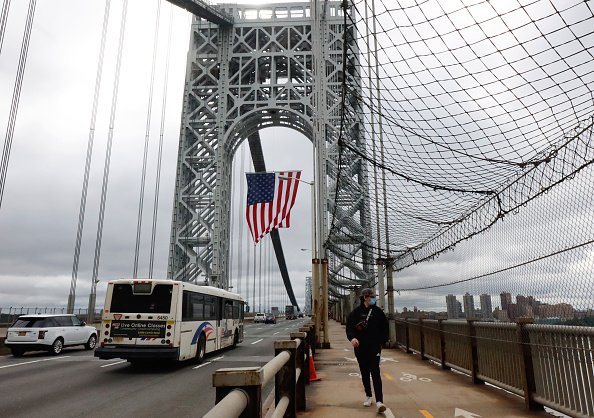 a bus crosses the George Washington Bridge into Manhattan.