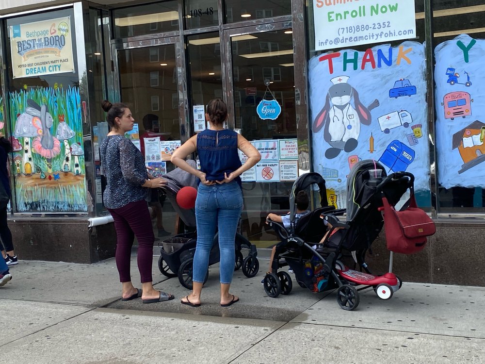 Mothers Picking up kids at daycare, Queens, New York.