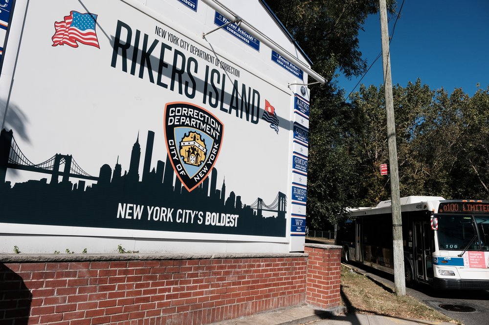 A sign marking the entrance to Rikers Island