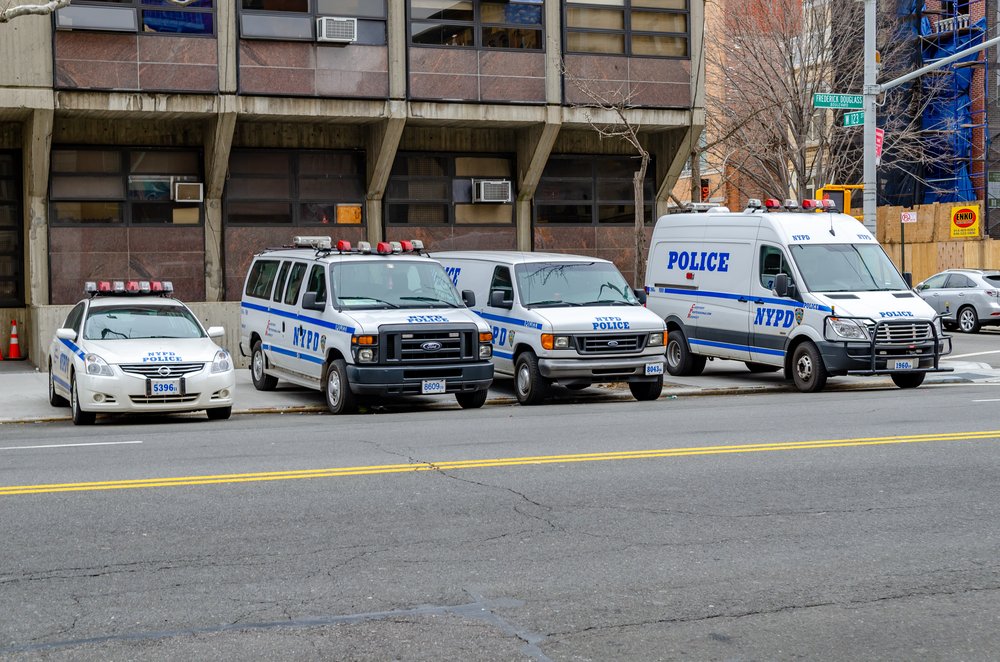 NYPD vehicles are parked in New York City.