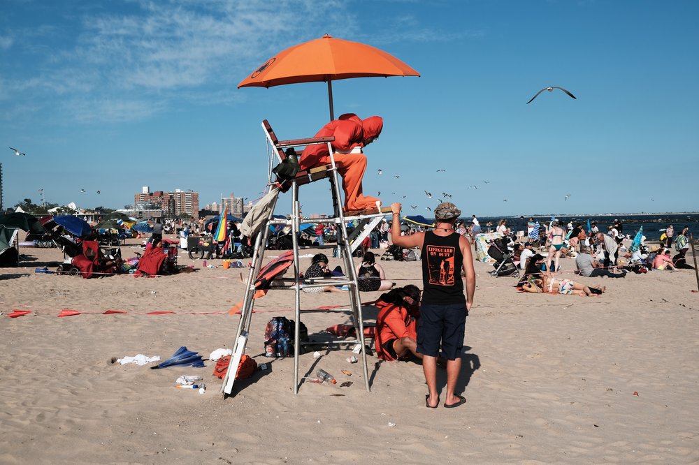 Lifeguards work on Coney Island beach on June 29, 2022.