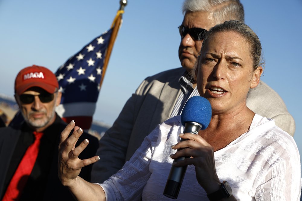 Alison Esposito speaks at a rally.