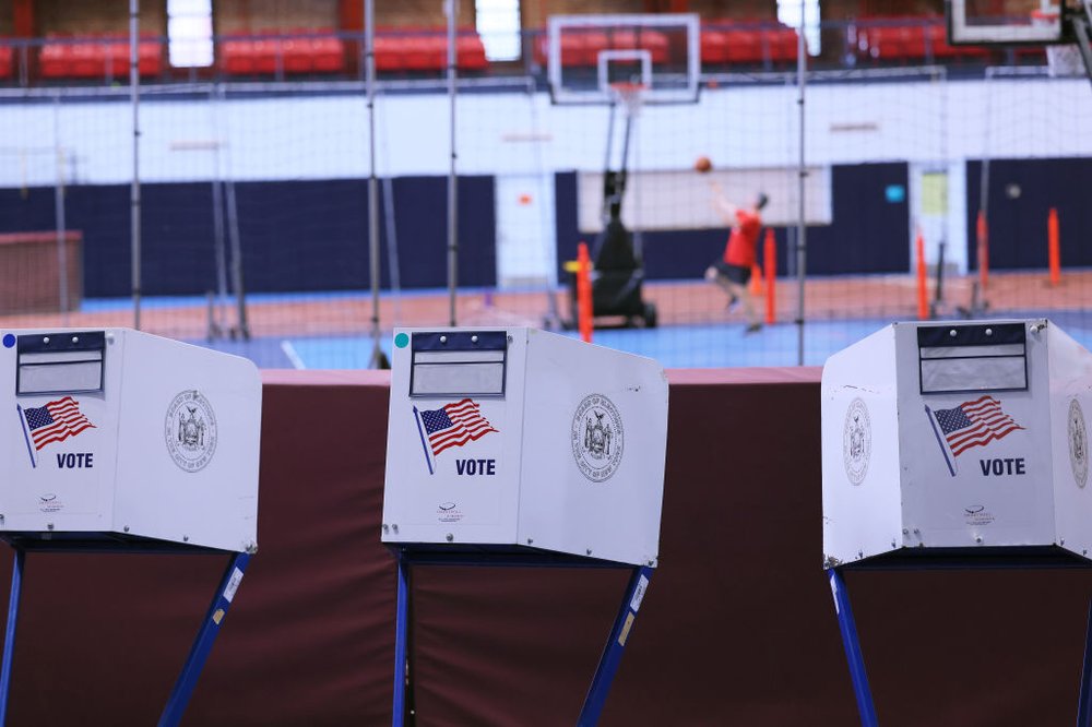 Empty voting booths inside the Park Slope Armory YMCA.