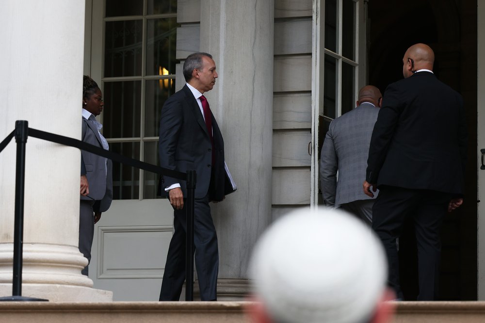 New York City's Department of Correction commissioner Louis A. Molina arrives at City Hall as people gather for a rally to protest the 17th death on Rikers Island on October 25, 2022 in New York City.