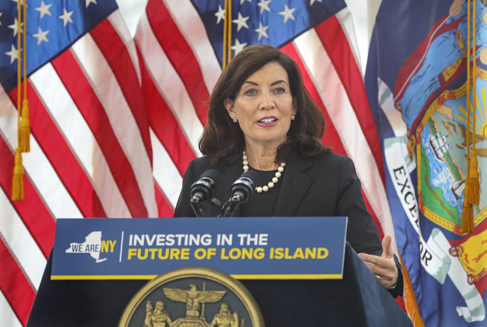 Gov. Kathy Hochul speaking behind a podium.