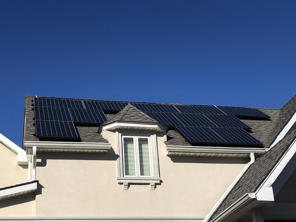 Newly installed solar panels on roof of residential home in Queens. The Adams administration is set to announce a program on Thursday offering low-income New York City homeowners the chance to install solar panels at low to no cost.