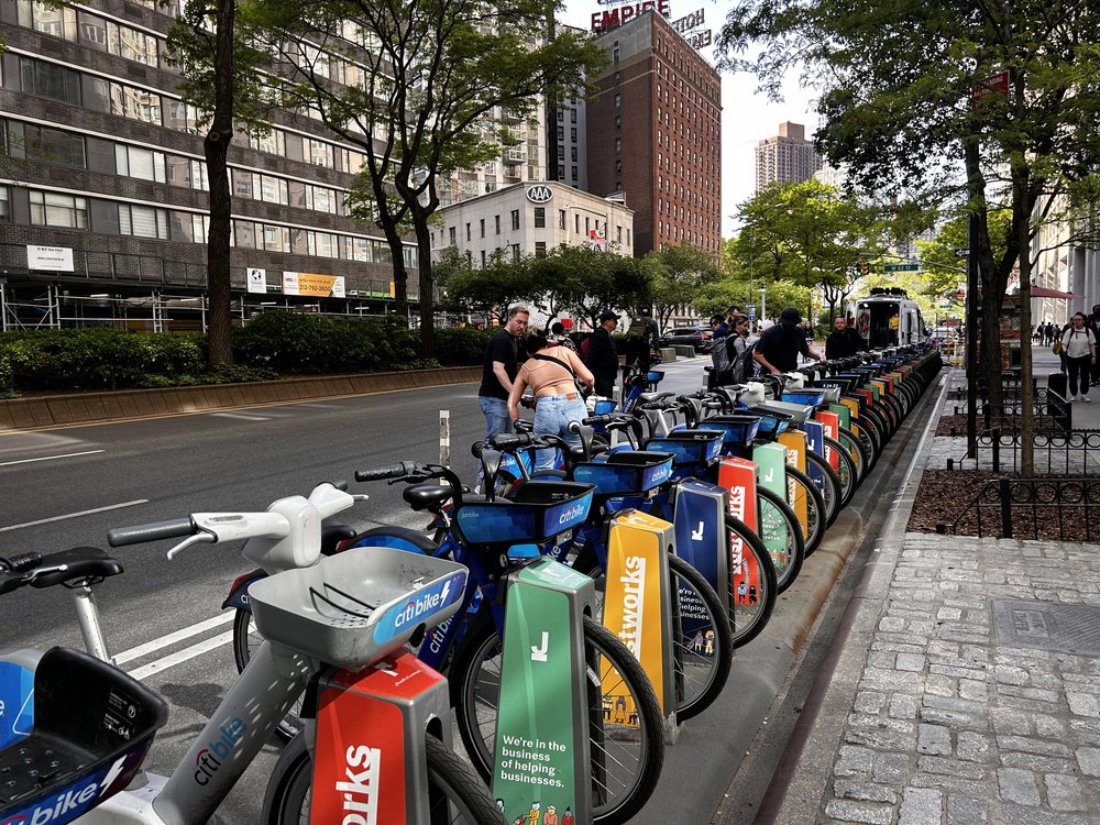 Riders pick up and drop off Citi Bikes at a docking station on the Upper West Side.
