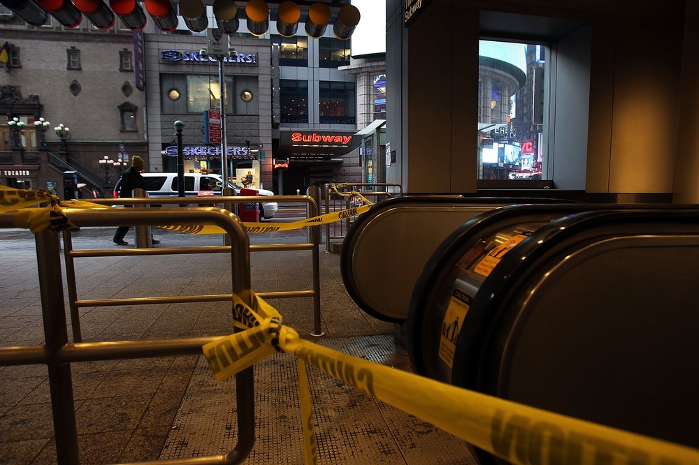A closed subway station is viewed in Times Square as Hurricane Sandy begins to affect the area on Oct. 29, 2012.