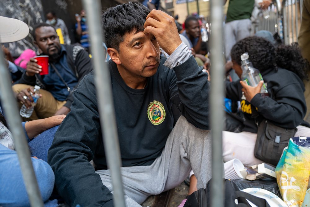 Dozens of recently arrived migrants to New York City camped outside of the Roosevelt Hotel on Aug. 1, 2023. The site was made into a reception center for newcomers at the height of the city's migrants crisis that year.