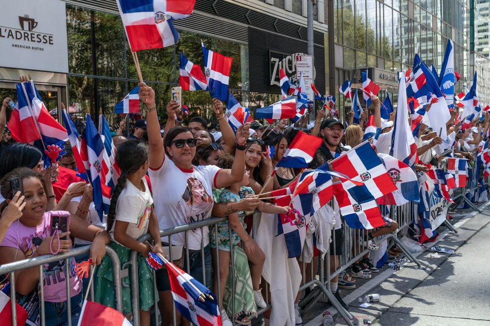 People celebrate at the Dominican Day Parade in Manhattan on Aug. 13, 2023.