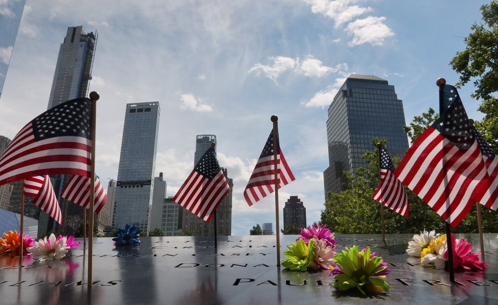 American flags mark names on the National 9/11 Memorial ahead of the 22nd anniversary of the attack on the World Trade Center on August 19, 2023, in New York City.