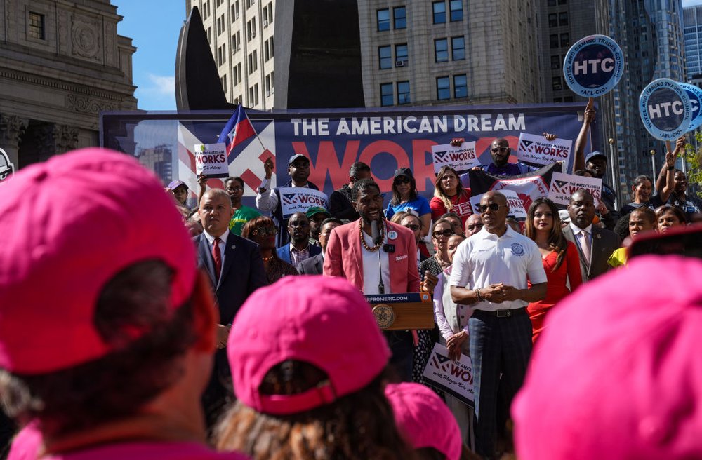 On Aug. 31, New York City Mayor Eric Adams hosts a rally and delivers remarks calling for expedited work authorization for asylum-seekers.