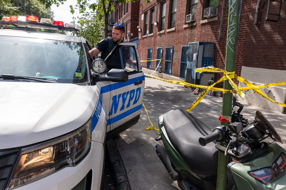 Police and crime scene investigators work at a Bronx day care center, after a child died and others were poisoned by fentanyl in 2023.