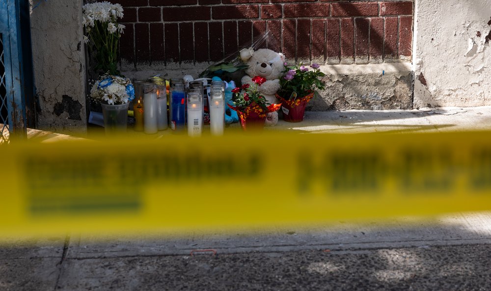 A small memorial is placed at the door of a Bronx day care center as police and crime scene investigators continue work, after a 1-year-old child died and three other children were injured from alleged exposure to the drug fentanyl last Friday, on September 21, 2023 in New York City.