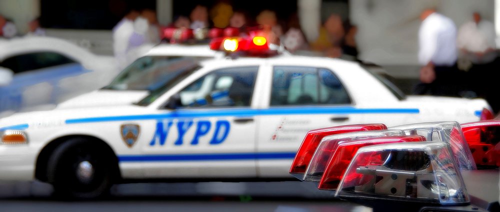NYPD patrol cars lights and sirens.