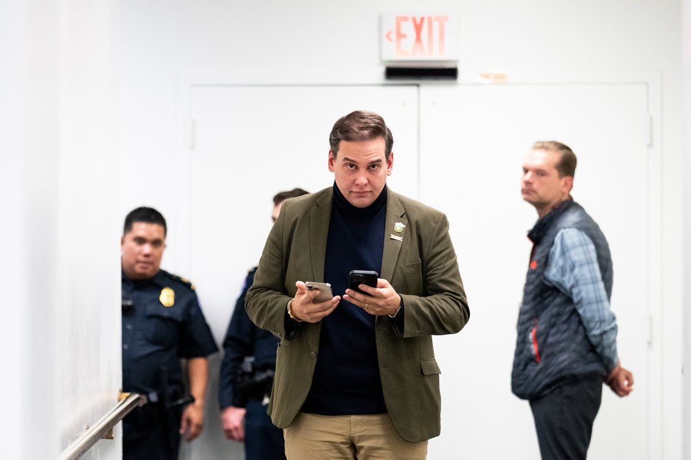 Re. George Santos leaves the House Republicans' caucus meeting for a members only discussion in the Capitol on Monday, Oct. 9, 2023.