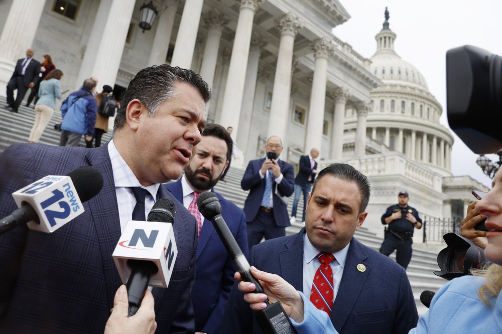 Rep. Nick LaLota, flanked by two of his Republican colleagues from New York, outside of the U.S. Capitol.